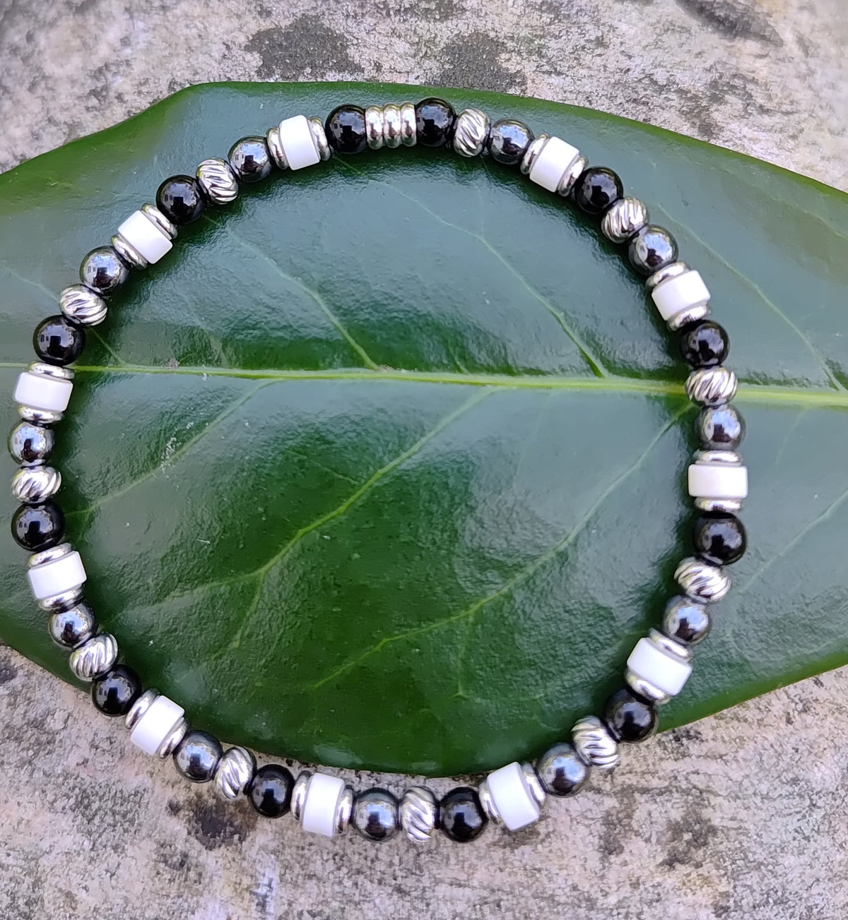 Onyx, Hämatit, Magnesit + Edelstahl, elastisches Armband mit Naturstein, 4 mm